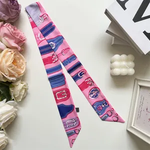 Detail of pink French silk scarf with vintage equestrian print and horse motifs
