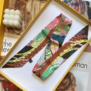 Floral print long narrow silk twilly scarf with abstract leaf patterns for women