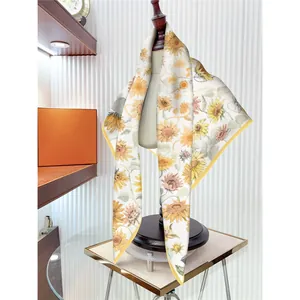 French vintage 90cm square scarf with sunflower print on a mannequin display