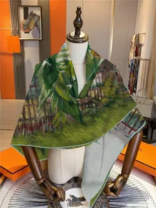 Detail view of artistic landscape oil painting silk shawl draped on a mannequin