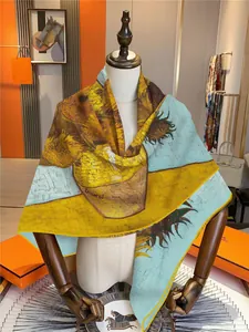 Detail of artistic floral scarf featuring Van Gogh sunflower print on a silk-like texture