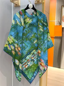 Detail of silk scarf with Monet Lily oil painting print hanging on a chic hanger