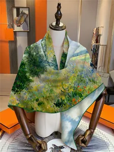 Detail view of the impressionist oil painting print and green hand-rolled edge on the silk scarf