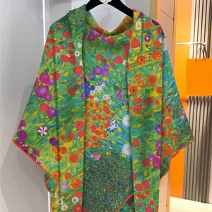 Cárdigan chal de cachemira con estampado artístico colorido y bordes naranja brillante