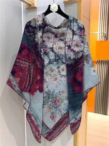 Detailed close-up of large floral silk shawl with impressionist oil painting chrysanthemum patterns