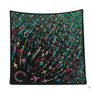 90cm square silk scarf featuring vibrant airplane prints and abstract C-pattern on black background