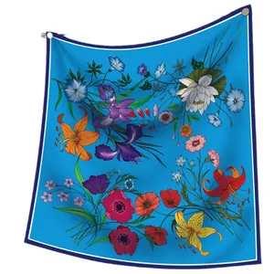 Royal blue floral silk square scarf top with elegant lily and iris prints on white background