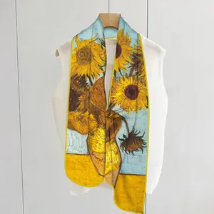 Elegant silk scarf featuring Van Gogh sunflower painting hanging on a wooden hanger