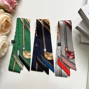 Three elegant French style printed silk twilly scarves with equestrian horse patterns