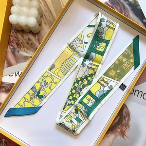 Pañuelo twilly de seda con estampado geométrico y caja de regalo amarilla elegante