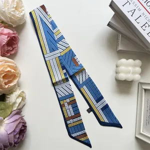 Macro detail of geometric twill silk ribbon with polished gold pattern on white background