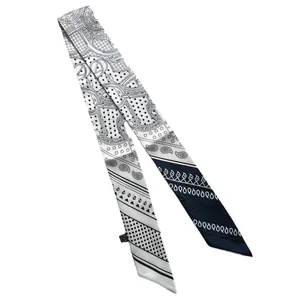 Elegant narrow scarf with polka dots and paisley patterns in black, white and navy
