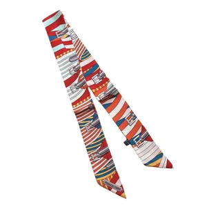 Narrow printed silk scarf with colorful diagonal stripes and belt buckle patterns
