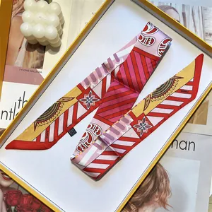 Colorful silk twilly scarf with geometric patterns and Paris print in a premium gift box