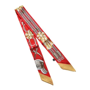 French style red silk twilly scarf with horse harness pattern and gold equestrian details