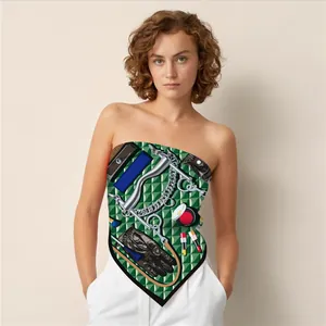 Detail of silk-feel square scarf styled as a tube top with green equestrian print