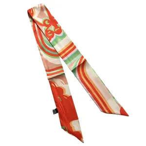 Vibrant orange silk scarf twilly with geometric pattern for women on white background