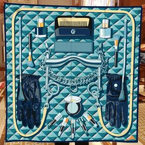 Detailed shot of silk feeling square scarf with equestrian and cosmetic patterns
