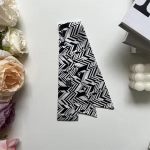 Elegant black and white geometric silk-feel twilly scarf for hair and bag styling