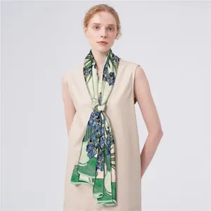 Artistic silk scarf with Van Gogh iris print worn by model on a grey background