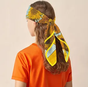 Van Gogh sunflower print silk scarf used as an artistic hair tie for a vintage look