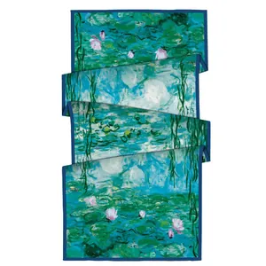 Elegant Monet Water Lilies silk scarf with deep blue edges on a white background