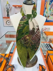 Van Gogh sunflower oil painting style silk scarf displayed on a white mannequin torso