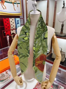 Artistic oil painting style silk twilly scarf with green foliage and orange flowers