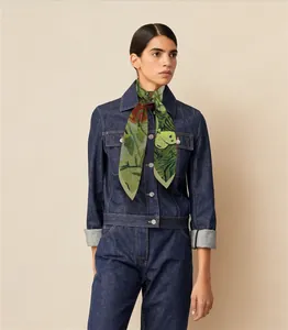 Close-up of Van Gogh oil painting style silk scarf with green floral and butterfly patterns