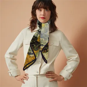 Detailed view of Van Gogh Starry Night print twilly silk scarf worn as a neck accessory