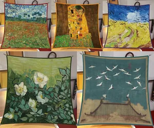 Detail of silk square scarves featuring traditional art and oil painting prints