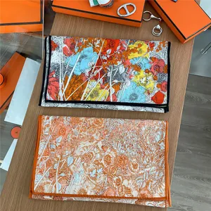 Close-up of luxury floral pattern silk scarves with vibrant prints and premium stitching
