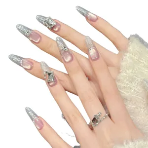 Sparkling purple cat eye press-on nails with luxury rhinestones and silver glitter gradient