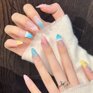 3D embossed press-on nails with colorful gradient flowers and pearl charms on long almond shape