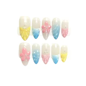 Colorful shell-patterned press-on nails with 3D pink flowers and sea blue gradient
