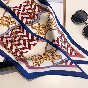 Elegant navy blue and beige polyester scarf with chain patterns and sunglasses