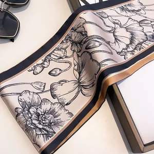 French retro style silk scarf featuring floral line art and elegant contrast borders