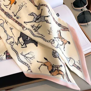 Vintage equestrian horse print silk scarf in beige and pink with a classic horse bit pattern