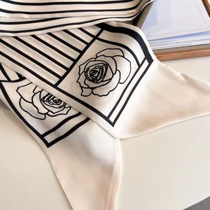 Elegant white silk scarf with black floral rose pattern and classic stripes for women