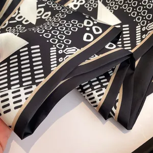 Abstract geometric silk scarf for women in black white and brown with polka dots