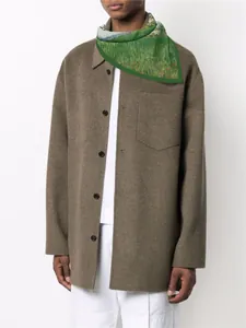 Detailed texture of green Van Gogh oil painting silk scarf on brown wool coat
