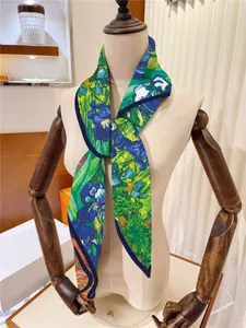 Detail view of Van Gogh Irises style printed silk scarf styled on a wooden mannequin