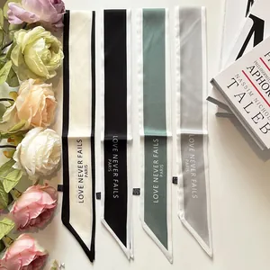 Elegant solid color silk twilly scarves for handbag handles with Paris themed text