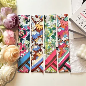 Long silk scarf for handbags and hair styling with colorful floral patterns and stripes