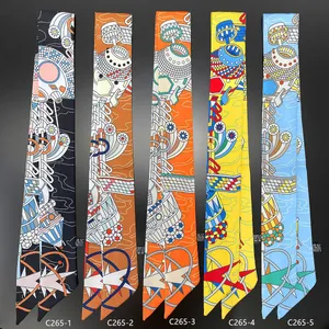 Narrow silk-feel twilly scarves with geometric patterns in five vibrant color options