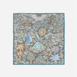 Close-up of lightweight square silk scarf with hand-drawn coconut trees and sun patterns