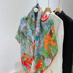 Close-up of artistic silk scarf featuring intricate animal prints and vibrant tropical patterns