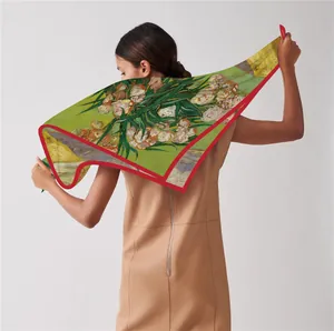 Detail of green 100% mulberry silk scarf with Van Gogh style floral art and red border