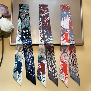 Narrow silk twilly scarf featuring forest and wildlife patterns for handbag decoration
