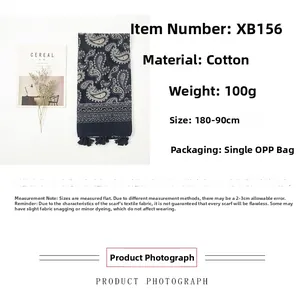 Detail view of navy paisley cotton scarf with tassels measuring 180x90cm and weighing 100g